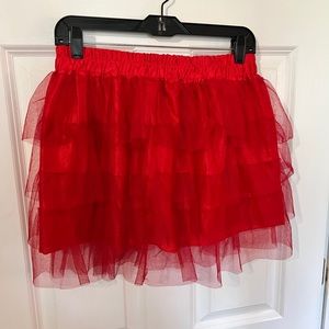 Fun red mini skirt Tully material on top & satin material underneath